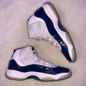 white and navy blue jordan 11’s